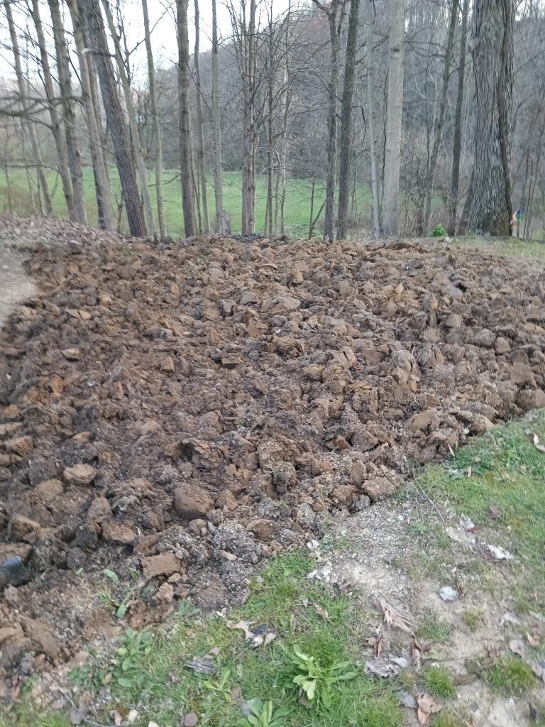 15' dug up with a shovel. 9' left. I am out of steam. I hope I wake up early and beat the rain tomorrow. Whew! Shower time.