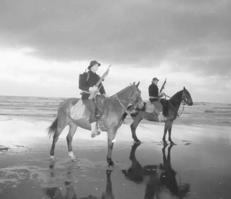 US Coast Guard Mounted Patrol, Florida, 1942. Both cavalry sailors are armed with the Rising M50.