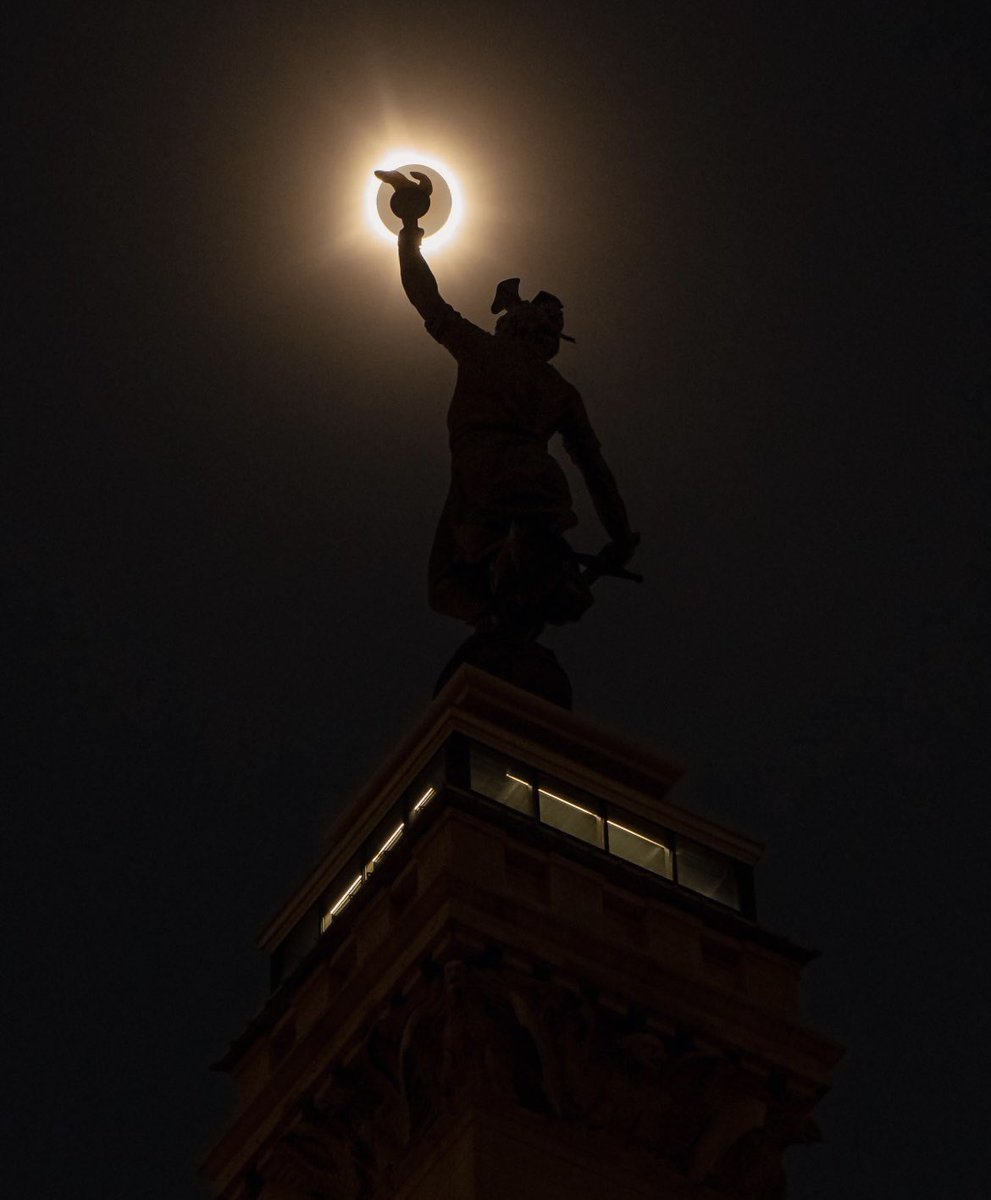 Some guy on Reddit captured a fantastic eclipse photo in downtown Indy.