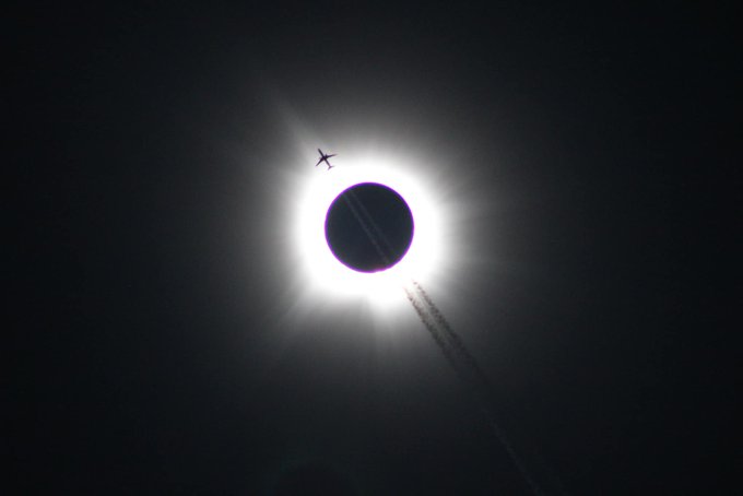 This was possibly the best prepared eclipse ever and already iconic pictures were taken.

This is a plane flying through the totality in Jonesboro photographed by Kendall Rust.