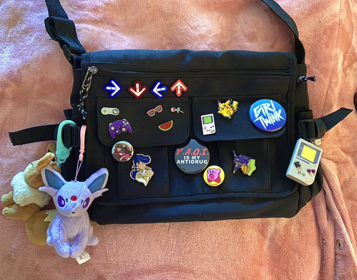 the closer i get to 30 the more i want to dress the way i wished i could in middle school and openly embrace my weirdgirl interests. anyway heres my new bag