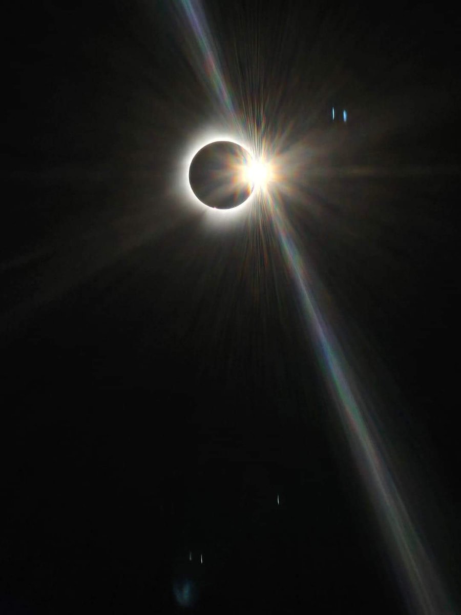 Taken today by my grand daughter as we watched #Eclipse2024 in Harley Ontario