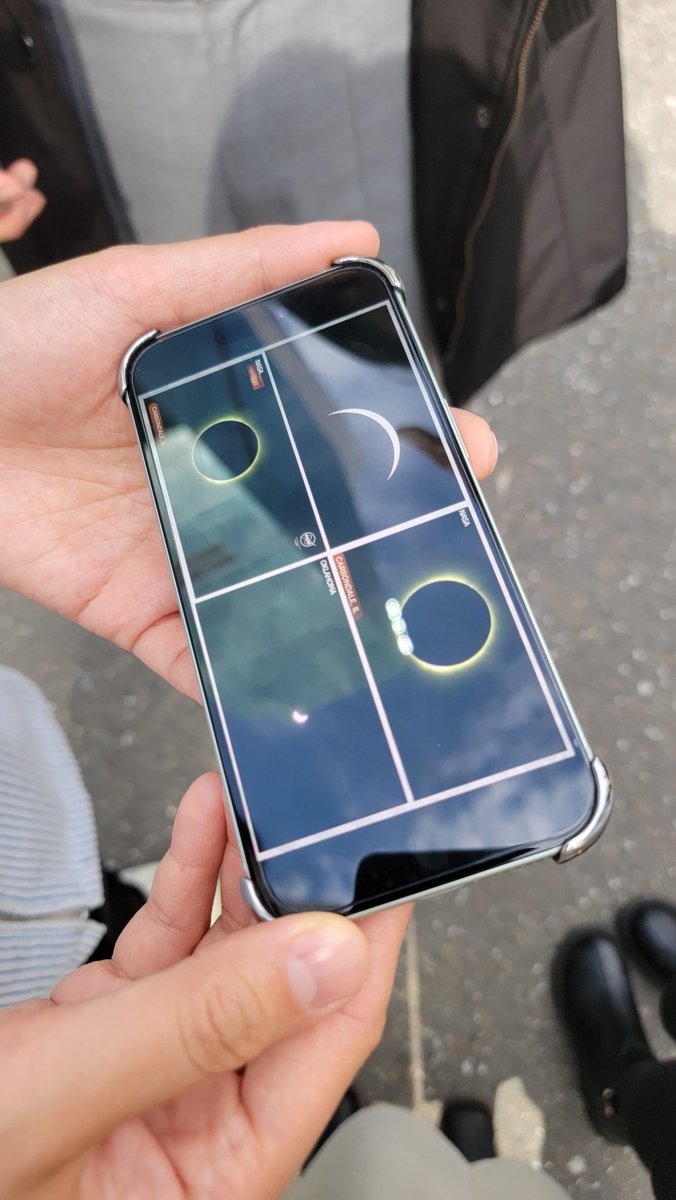 my coworkers and I went outside together to see the eclipse but NO ONE brought glasses so we stood there and watched a livestream on a phone instead like idiots 💀