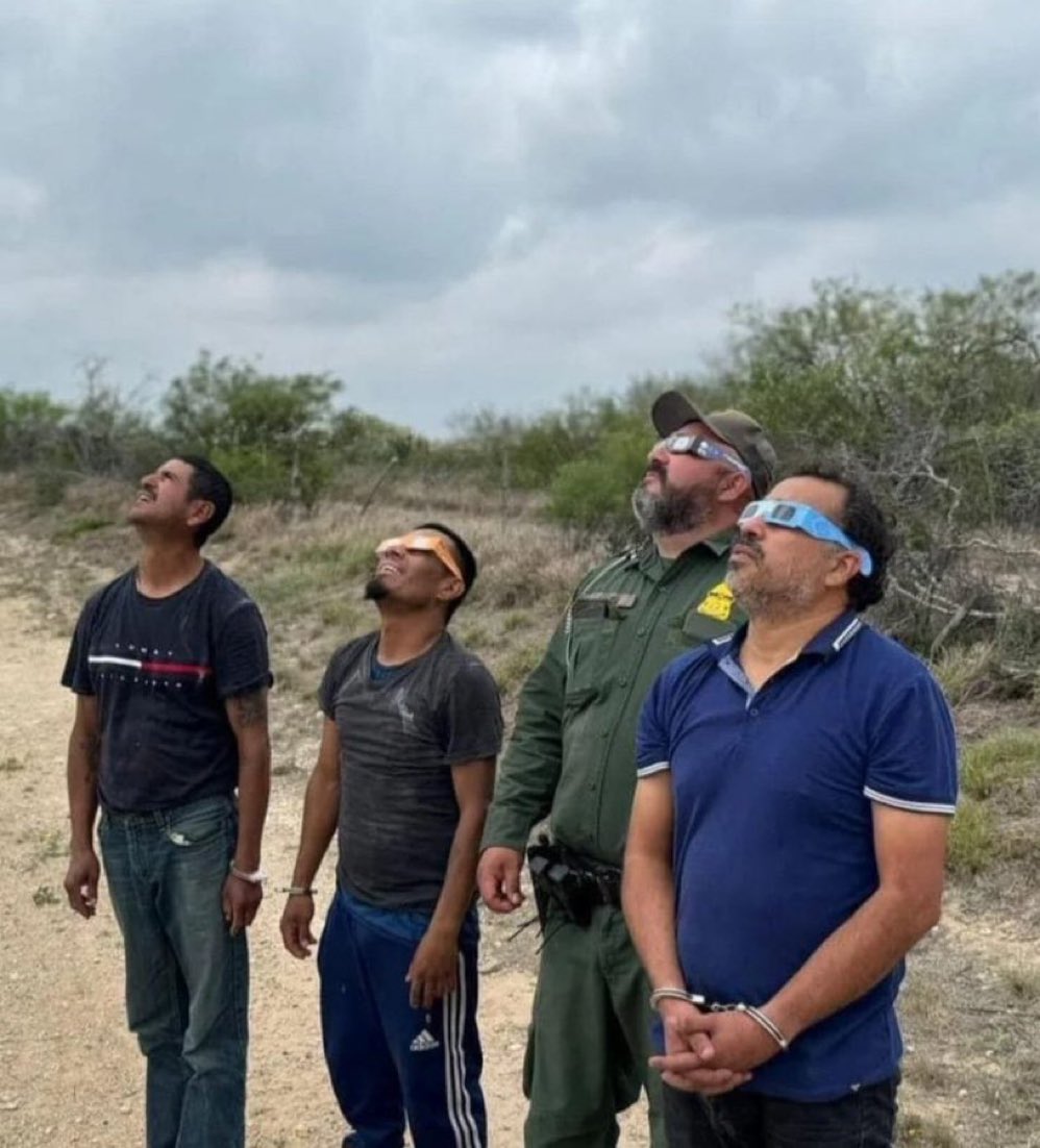 USA—arrested illegal border crosses/immigrants together with border protection officer watching solar eclipse. Indeed.. you can’t make this stuff up😂😂😂