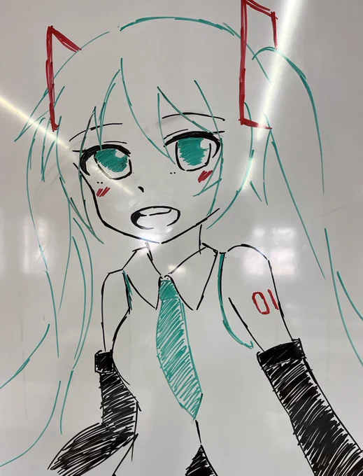 お昼休みに会社のホワイトボードに初音ミクを描くなどしている 