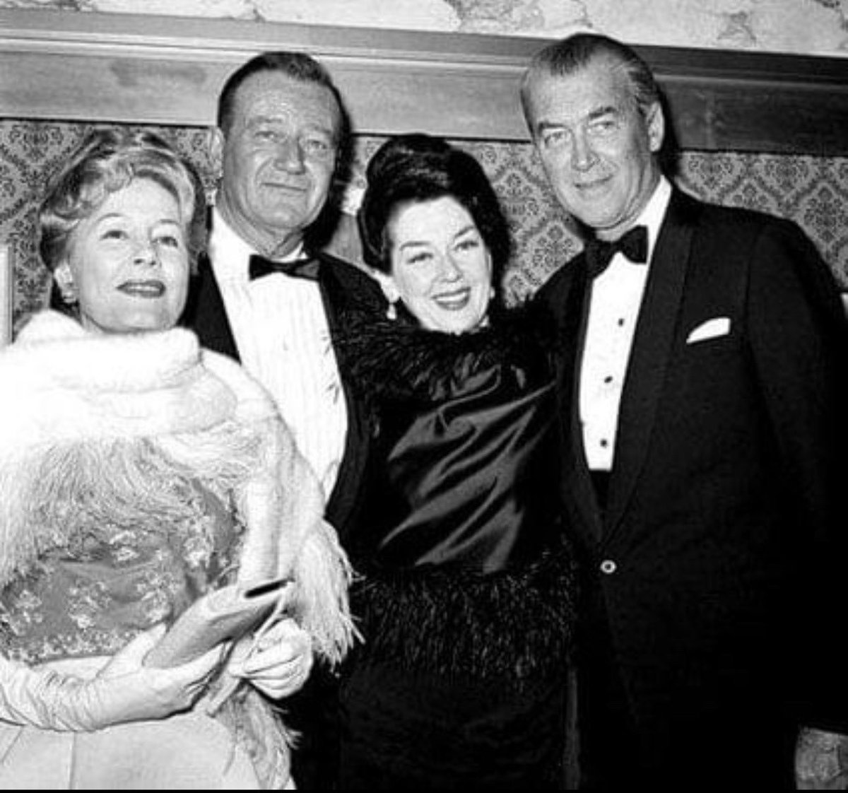 I love seeing photos like this knowing they were old chums over the years. #IreneDunne #TheDuke #Roz and #JimmyStewart at the premier of How The West Was Won