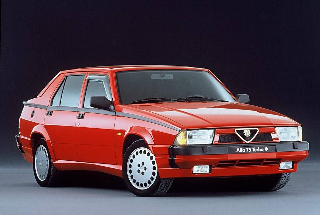 People often mention the quirky lines of the Alfa 75, the fact its doors are just capped 116 Giulietta items (from 1977), or that its window switches are mounted on the ceiling. Nobody mentions that The Angel of the North was copied from its spectacular cigarette lighter. #Alfa75