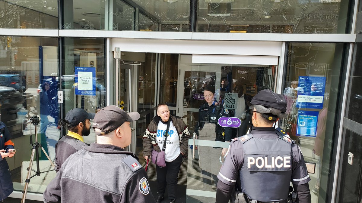 Nine climate activists arrested in TO this morning demanding #RBC stop funding fossil fuel projects worldwide. #climate @ExtinctionR @CBCToronto