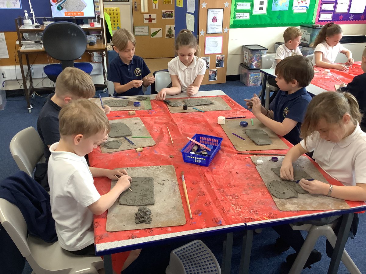 Class 2 have learnt how to create a clay tile.  They worked hard to roll and cut the clay before printing a repeated pattern on it. #GawberArt #GawberSuperStars