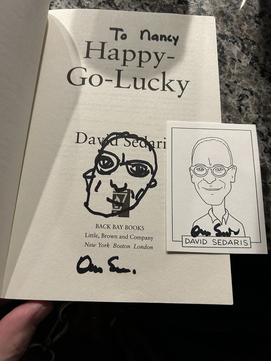 Saw David Sedaris last night at a reading. Before the show, he signed my card and redrew the pic in our book. Super fun!