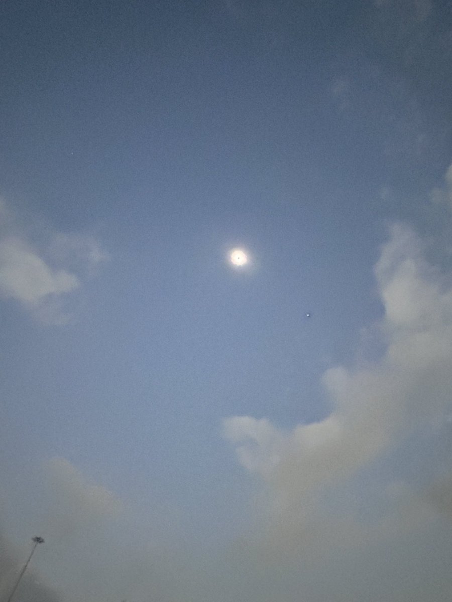 Yeyo7189's tweet photo. I’m pretty sure @Apple  got some explaining to do!!  So 1st photo is android sent to me by a friend, I think she has a galaxy.  The rest are from my iPhone, as my daughter @__WorkInProgres  would say looks like it was shot with a potato!!!  #Eclipse2024 #EclipseSolar2024 #iPhone https://t.co/X0S1zQIAQ6