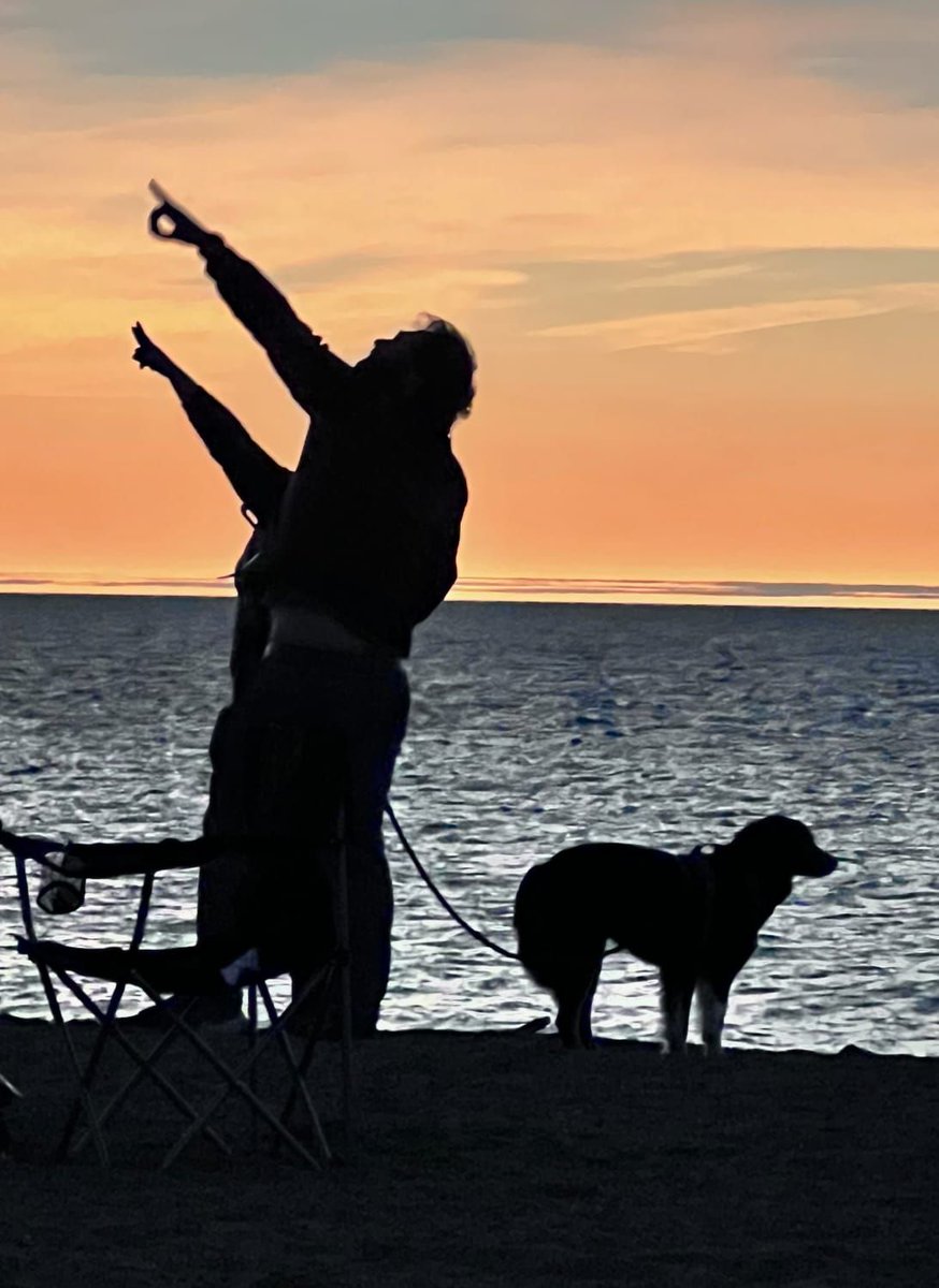 A kind stranger captured us during totality on Lake Erie! Luna was not as excited by the corona.