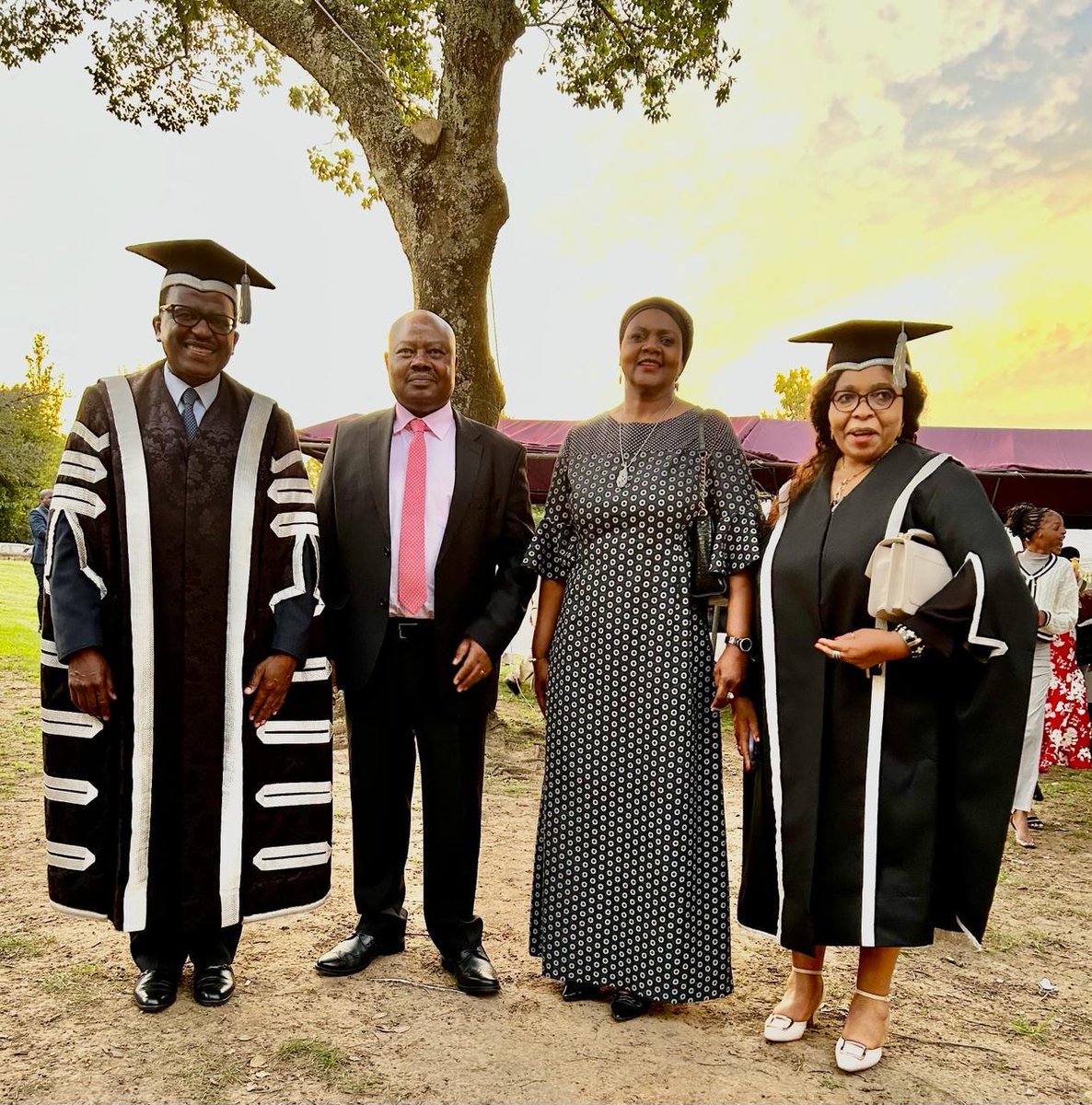 Vice-Chancellor Mabizela and our DVC: Academic and Student Affairs Prof Monnapula-Mapesela stand with two proud Lesotho parents at #RUGrad2024 - Hon Chief Justice Sakoane Sakoane and Auditor General Ms Gail ‘Mathabo Makenete. Their children are continuing with honours studies at…