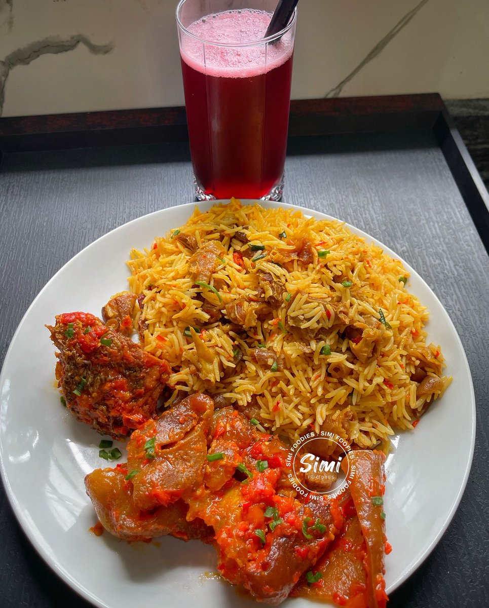 Asun Rice with a cup of Zobo