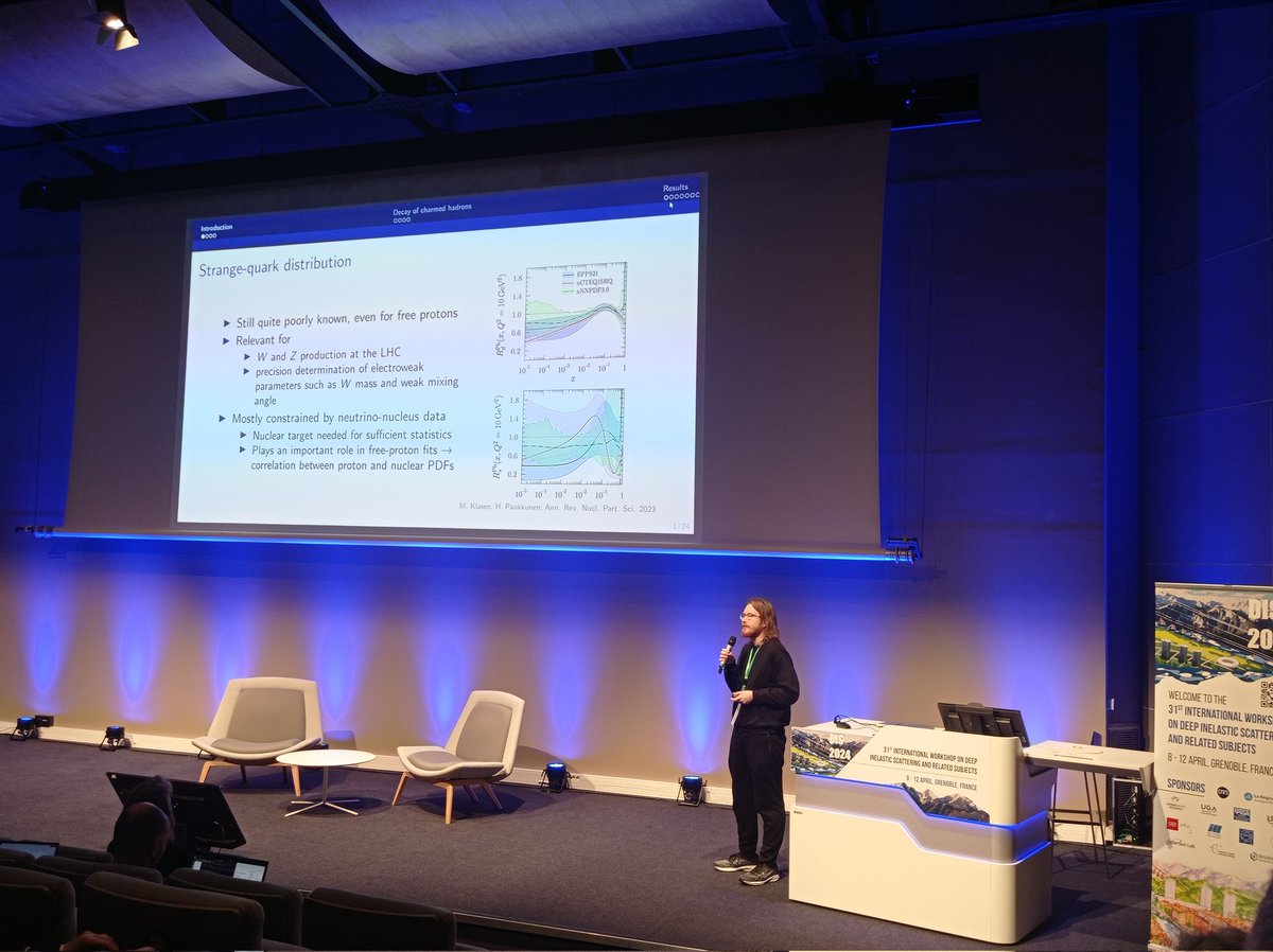 And here's Sami Yrjänheikki in the big auditorium, talking about neutrino DIS.