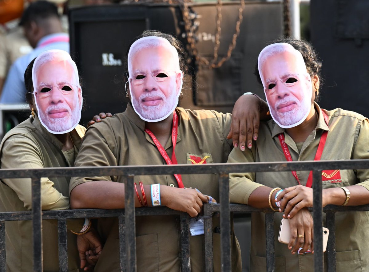 Three employees of India Post wearing Modi masks and participating in the Lok Sabha election roadshow by BJP leader and Prime Minister Narendra Modi in Chennai on Tuesday. Photo: B Jothi Ramalingam / The Hindu.