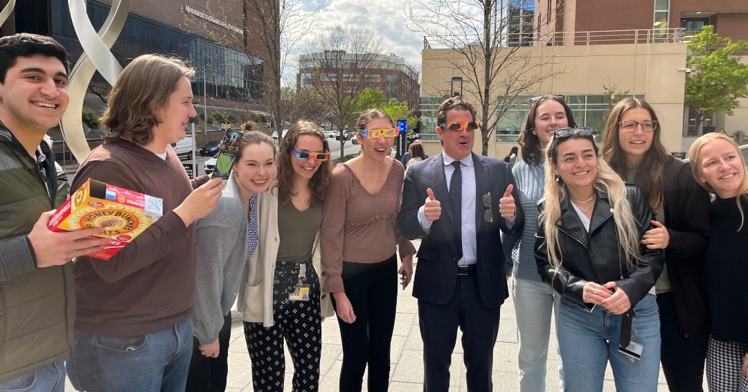 Dean Mark Gladwin joined faculty, staff, and students in catching a glimpse of the solar eclipse. #DeanGladwinOnTheMove