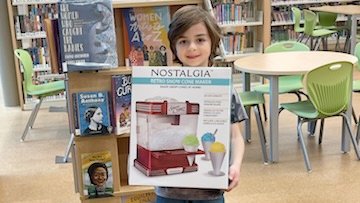 Congratulations to Evan! He is the winner of our Winter Reading Club! Have fun with the snow cone maker and fixings!