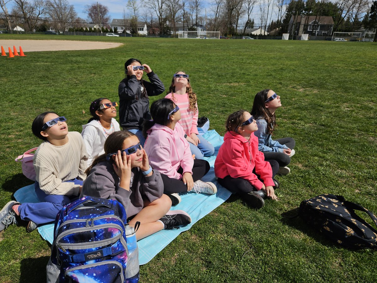 Students, families, and faculty all gathered together for yesterday's solar eclipse at the RCSD fields. Thanks to the Rye Fund for Education for providing the eclipse glasses. The experience was out of this world! 🌎🌞🌕🌖🌗🌒 #RyeCommitment