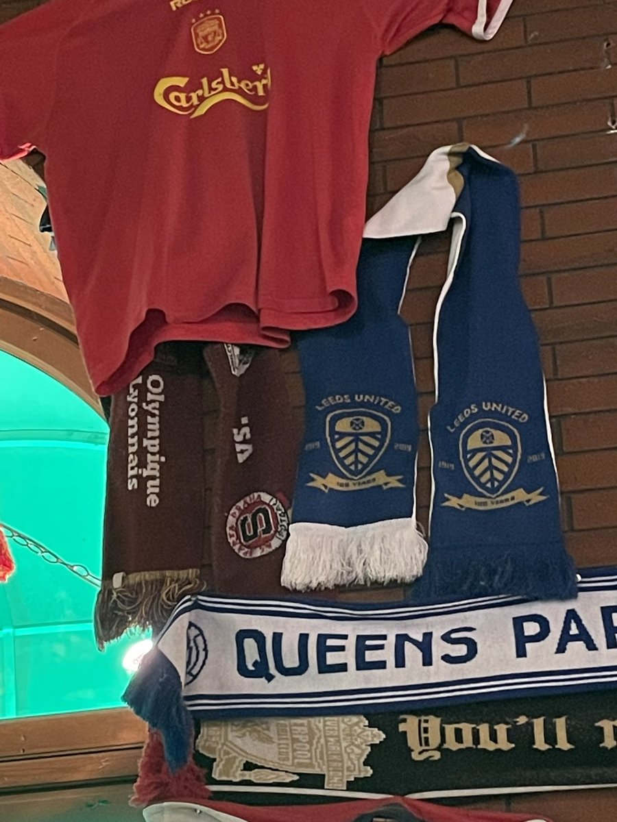 What are the odds being in a pub in #Prague watching #ARSBAY and seeing a scarf of @OL hanging on the wall??? @etrepo By the way, pour les fans du @PSG_inside demain c’est au #DutchPub (also for my friends attending #ISHLT2024)