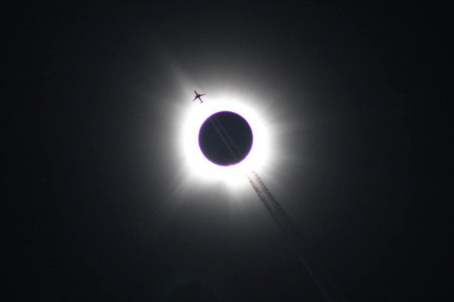 Aircraft soaring through a complete solar eclipse over Jonesboro, Arkansas, offers a breathtaking spectacle of nature's wonders. 
#SolarEclipse #AerialView #JonesboroArkansas #AviationAdventure #CelestialSpectacle #NatureWonders #UniquePerspective #OnceInALifetime