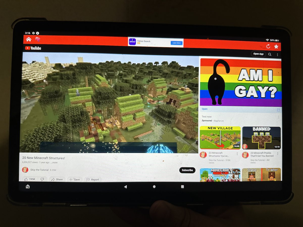 An ad titled 'AM I GAY?' with a picture of a cat's b*tthole appears next to a Minecraft video on YouTube Kids. Why is @YouTube promoting this on an app meant for young children? Parents BEWARE!