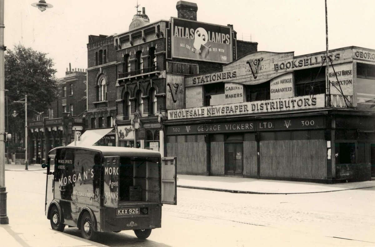 Morgan's delivery van opposite George Vickers, newspaper distributors at 300-302 Brixton Road. Dated September 1952. #Brixton #1950s #Streets