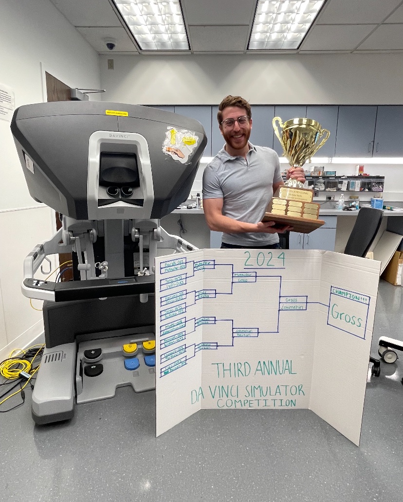 our very own pgy4 @GrossMedicine took the trophy at the Cleveland Clinic wide Robotic Sim tournament! reports are people traveled from all over the country to be in CLE this weekend just to watch! @CleClinicUro @CleClinicUroRes