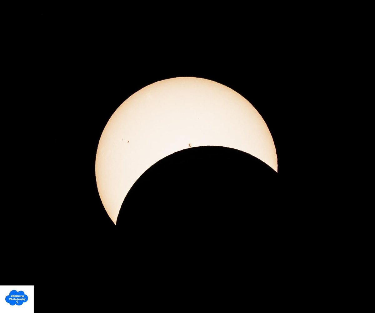 Jeremy Bower at the Department caught the stellar beauty of yesterday's eclipse - check out those sun spots! Who else was watching? 🌒 #Eclipse #SunSpots DNR.Nebraska.gov