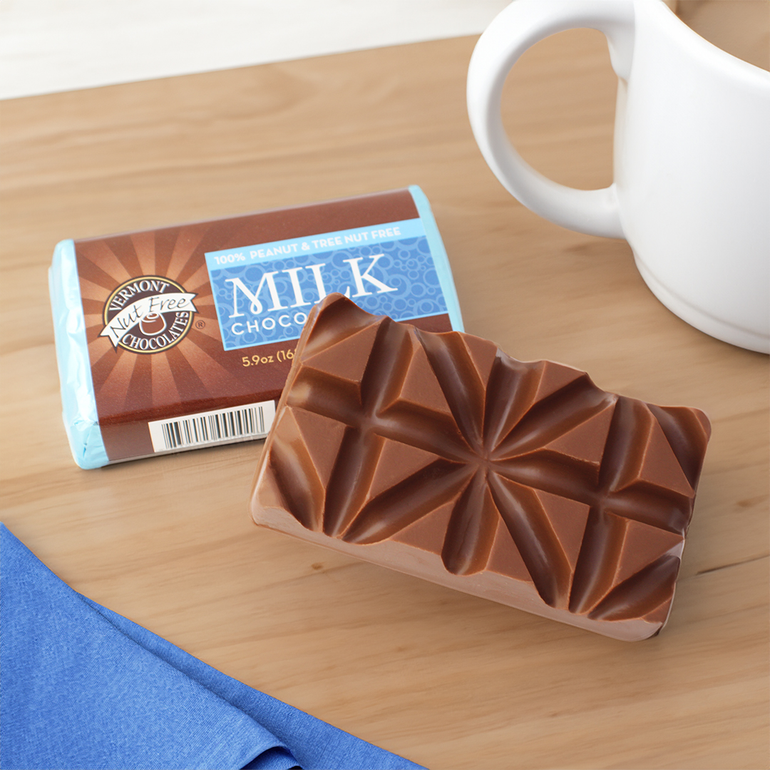 Elevate your morning brew with a bit of chocolate ☕🍫 Our chunky, break-apart bars will pair nicely with your favorite cup of coffee or tea. Just snap off a piece and enjoy! Shop #NutFree Large Chocolate Bars: ow.ly/1raj50R2iBz