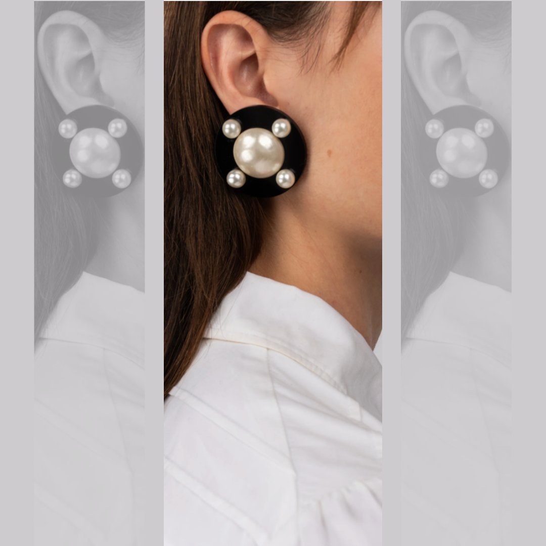 Runway to Her-Age: These Chanel Earrings from the 1987 spring runway collection feature elegant artificial pearls and a clip-on model for convenience. Available on her-age.com #chanel #vintageearrings #timelessfashion