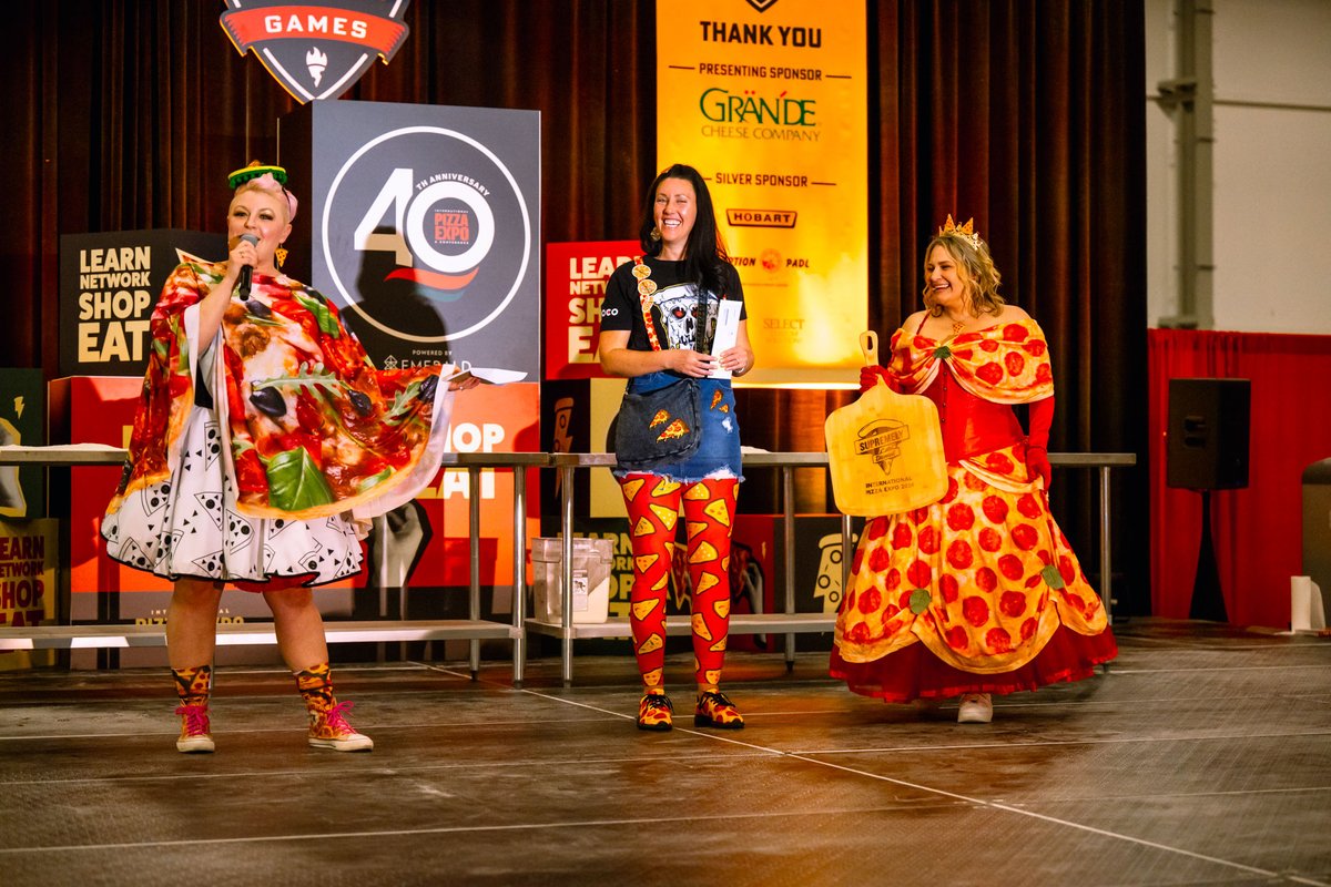 Congratulations to our reigning style queen, Mandy Gesuale Elston, for her supremely dressed victory! 👑🌟 And a round of applause to our fabulous runner-up, Lindsey Beddard! 🥈✨ . . #PizzaExpo #PizzaToday #PizzaCon #Expo #Pizza #Pizzeria #PizzaIndustry