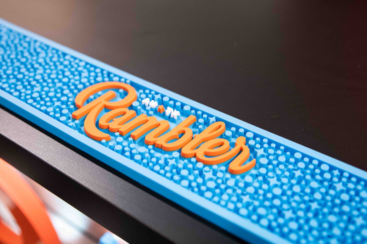 Stepping into the #RamblerSparklingWater booth is like stepping into your favorite local dive - complete with wood paneling, checker flooring, and the nostalgic glow of neon signage⚡🤠🍺 
#goodtimecreative #creativeagency #tradeshowbooth #expowest #boothdesign #exhibitdesign