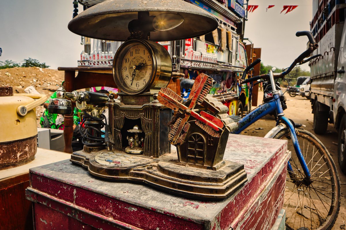 Found this whimsical clock at a flea market! The little umbrella and working phone are pure magic. #streetphotography #photography #photo #travelphotography #streetstyle  #streetart #travel #urbanphotography #art #streets  #picoftheday #life  #streetphotographer #madewithluminar