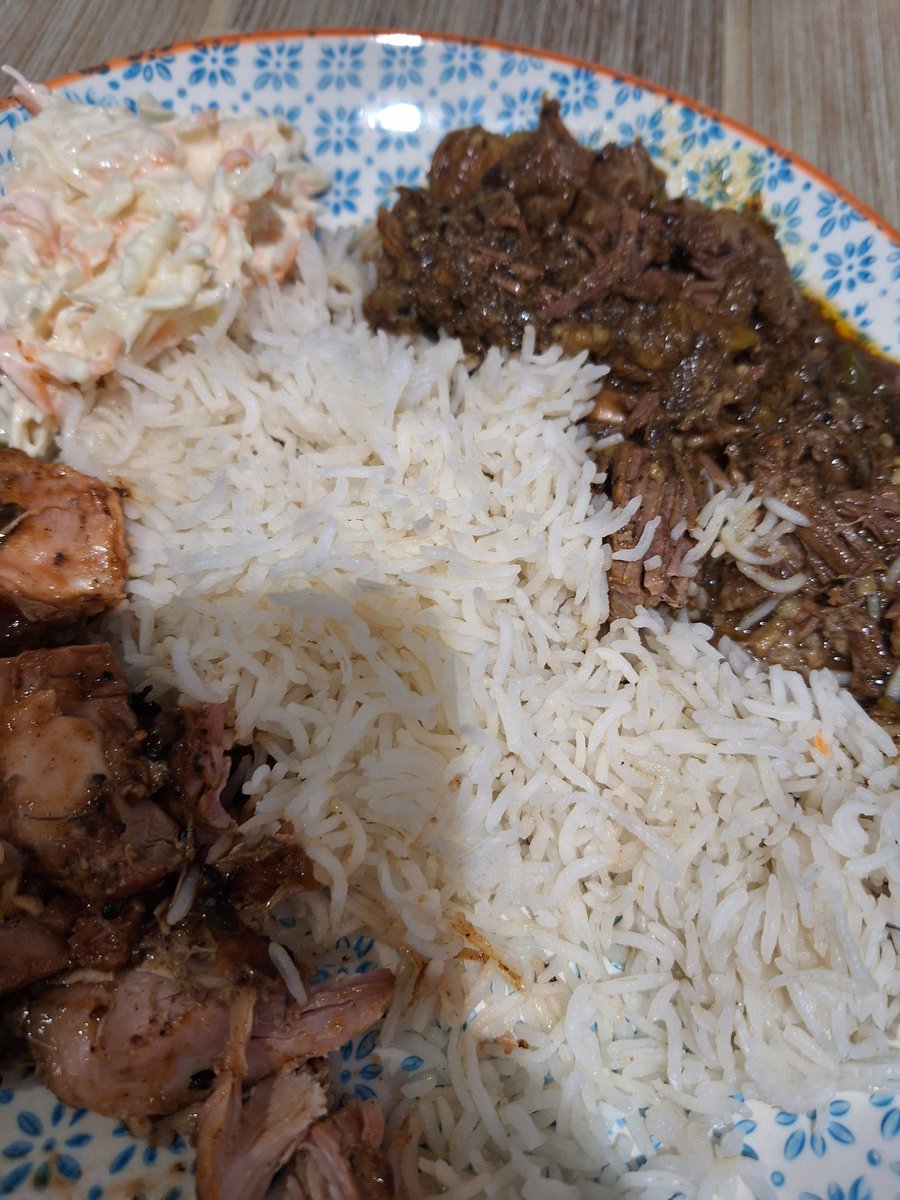 Curry goat, jerk chicken, rice and coleslaw for dinner tonight. The curry goat is delicious. Shame the food van had run out of rice so I had to just chuck some basmati with it, but man this is niiiiiiiccccccee!