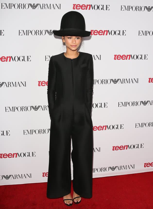 Zendaya defends her infamous 2014 Teen Vogue party look: “I still see memes about this look with my hat. I stick by it. We thought it was chic at the time, and I think it’s still chic. I’d wear it again.”