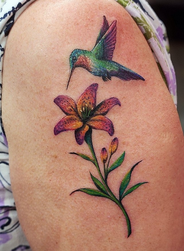 Beautiful, full color, hummingbird and flower by @juicyinktattoos 🌸 Ready for some spring & summer ink? Email us at countstattoo@gmail.com to book an appointment. ✨ @DannyCountKoker @CountsKustoms