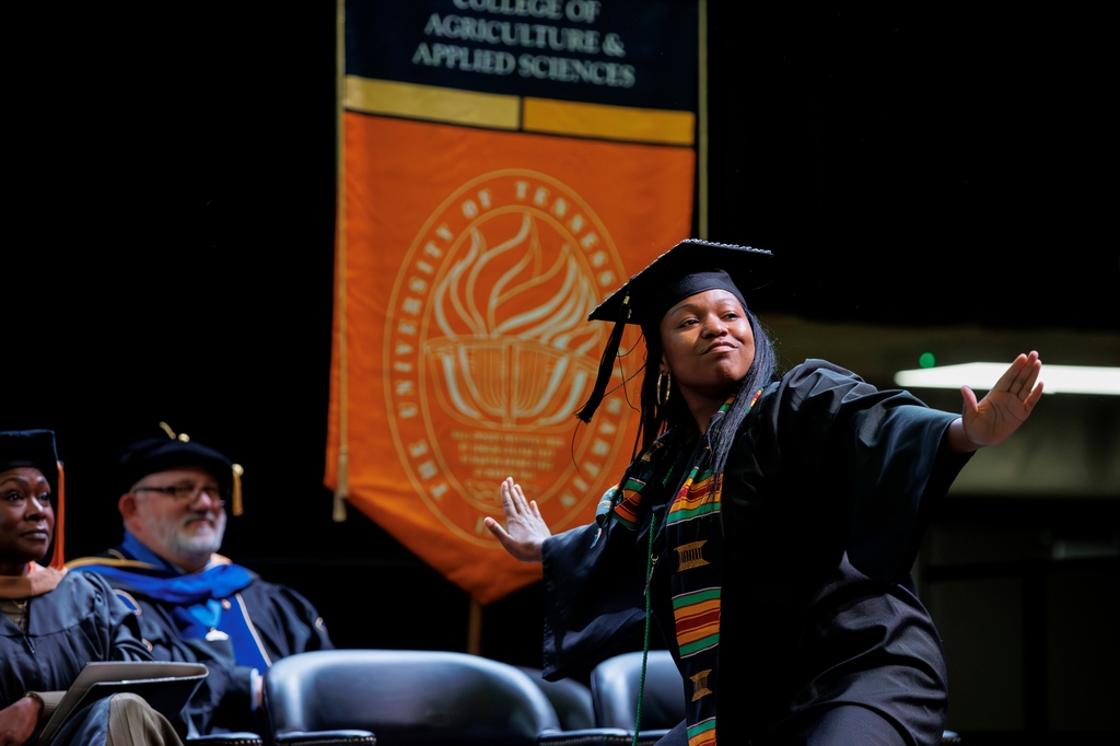 In Spring 2024’s “The Scene,” M’dia Walker, an organismal biology graduate from Covington, dances as she crosses the commencement stage at @UTMartin in December.