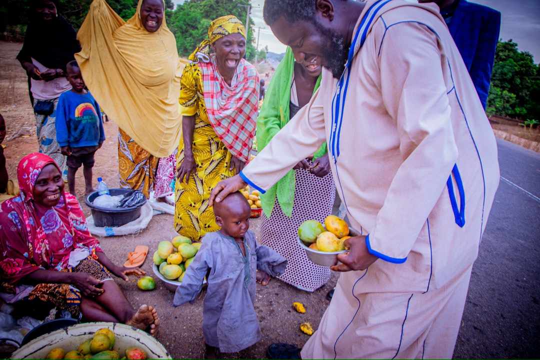 Hon Yusuf Adamu Gagdi said when he saw this boy “ I was like this boy, My clothes were worse than this, I used to sell AKARA for my mother in GUM-GAGDI. This might be the next president of Nigeria'.