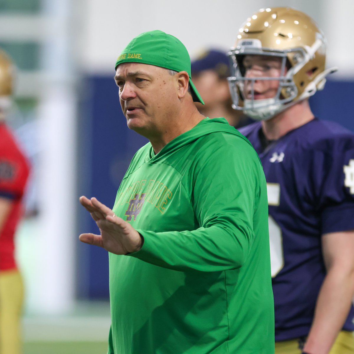 What has Mike Denbrock brought to the Notre Dame offense? More line of scrimmage control for the QBs. 'He gives us the ability to check out of plays, flip plays, get us to a different look if we see something from the defense,' Kenny Minchey said. That's new in South Bend.
