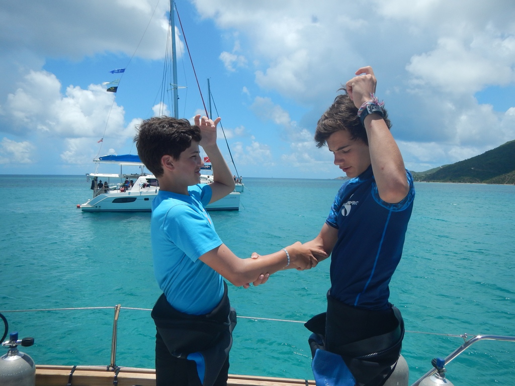 Who knows what skill these two are practicing? #diving #skills #sailing #summercamp #caribbean #NAUIWorldwide