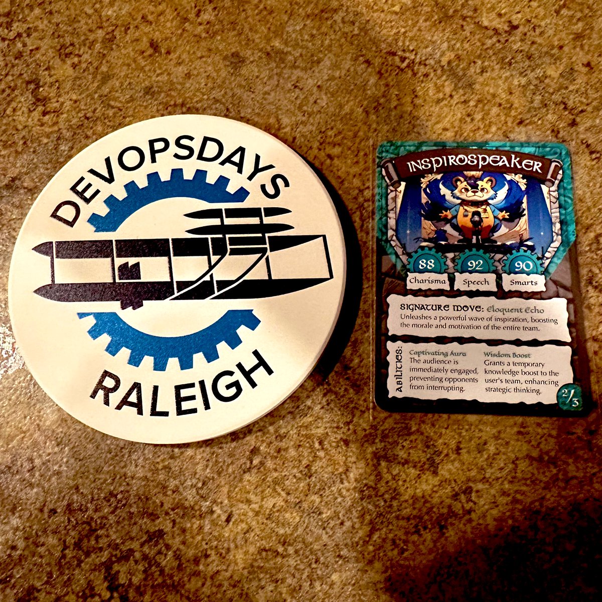 Wow, I'm loving the gifts I received from the organizers at @DevOpsDaysRDU! They gave me a coaster and even a custom designed Pokémon card! 🙌 See you this week downtown Raleigh 🚀 devopsdays.org/events/2024-ra…