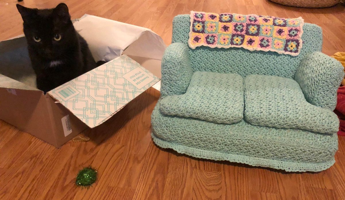 Cats and their tiny crocheted couches