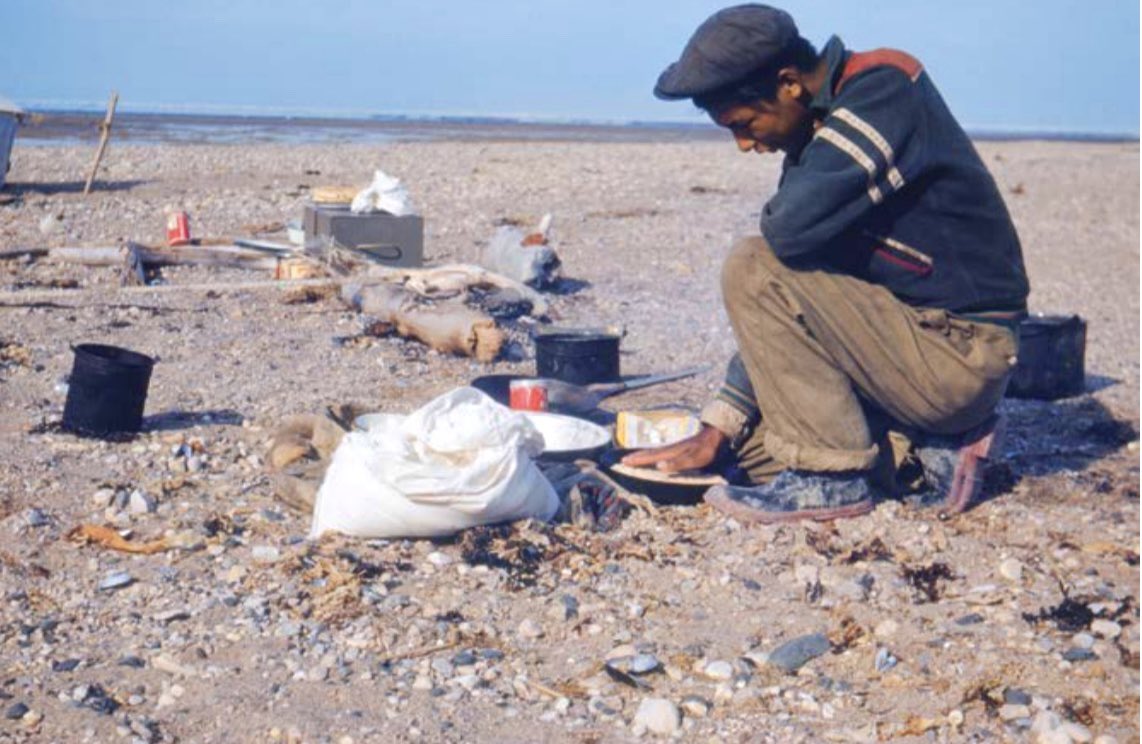 Douglas Kakekaspan of Fort Severn, making bannock on the shore of Hudson Bay. Photographed in 1953. 📷 John Macfie | from ‘People of the Watershed,’ opening at The McMichael Canadian Art Collection, Kleinberg, Ontario, on May 11.