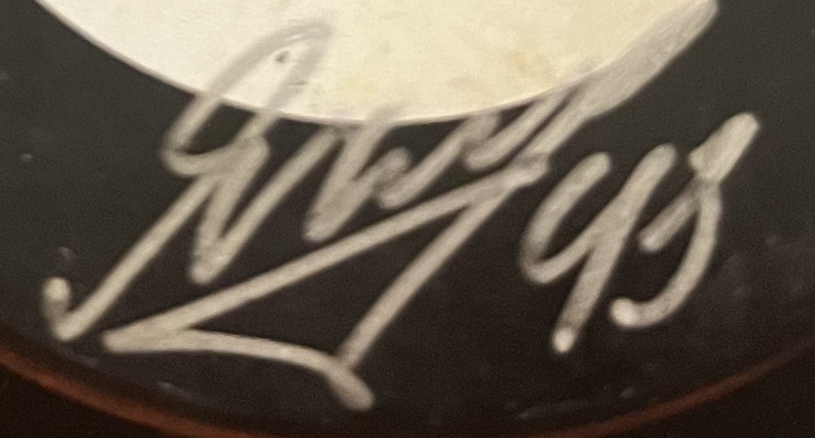 DanielDossey's tweet photo. Can someone help me figure out who signed this? I got the puck after my grandmother passed away and I’m not familiar with the signature. @LAKings https://t.co/3xznXy2WAc