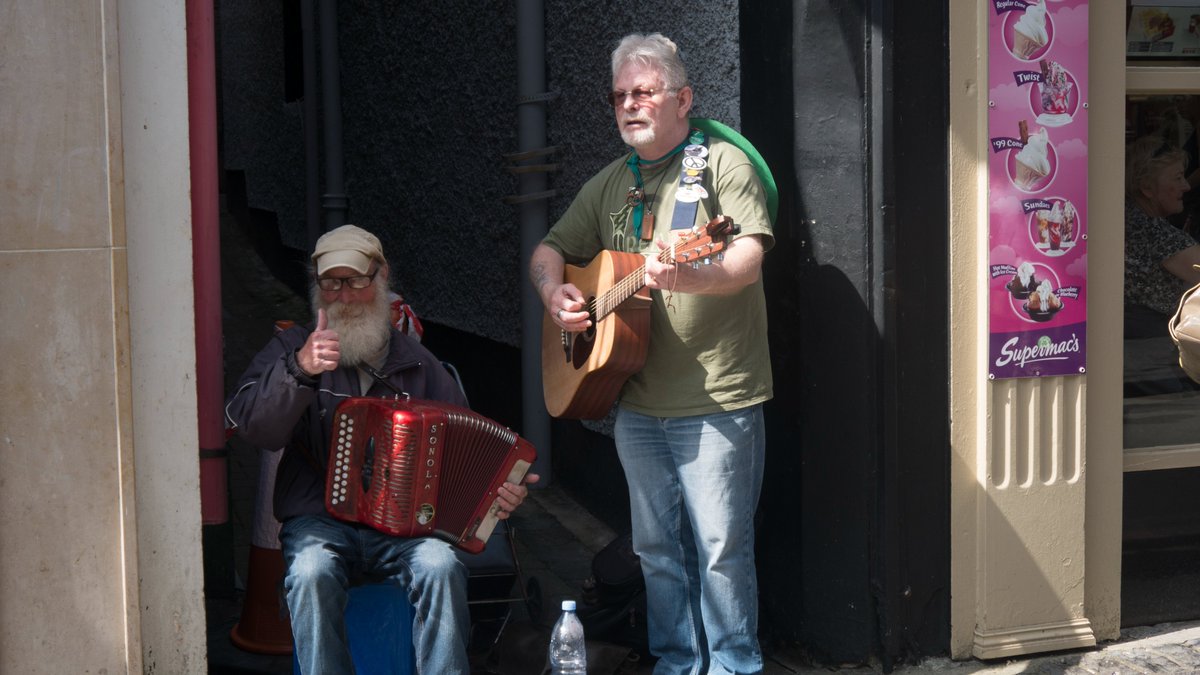 TBT  ~ Musicians on Ennis' O'Connell Street 
performing  as part of 'Fleadh Cheoil 2016'
1:54pm 16th August 2016.  
 #TBT #ThrowbackTuesday  #Photography #StreetPhotography #Urbanscape #townscape #Ennis #FleadhCheoil #Clare #Ireland #Townscape #Ireland