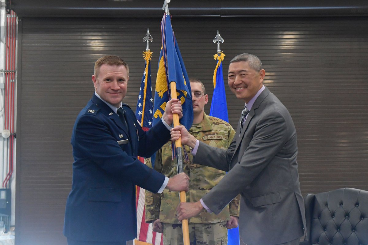 75th Civil Engineer Group welcomes new civilian leader! Right, Peter Feng, incoming 75th CEG director, receives the guidon from Col. Jeffrey Holland, 75th Air Base Wing commander, during an assumption of leadership ceremony April 5, 2024, at Hill Air Force Base, Utah.