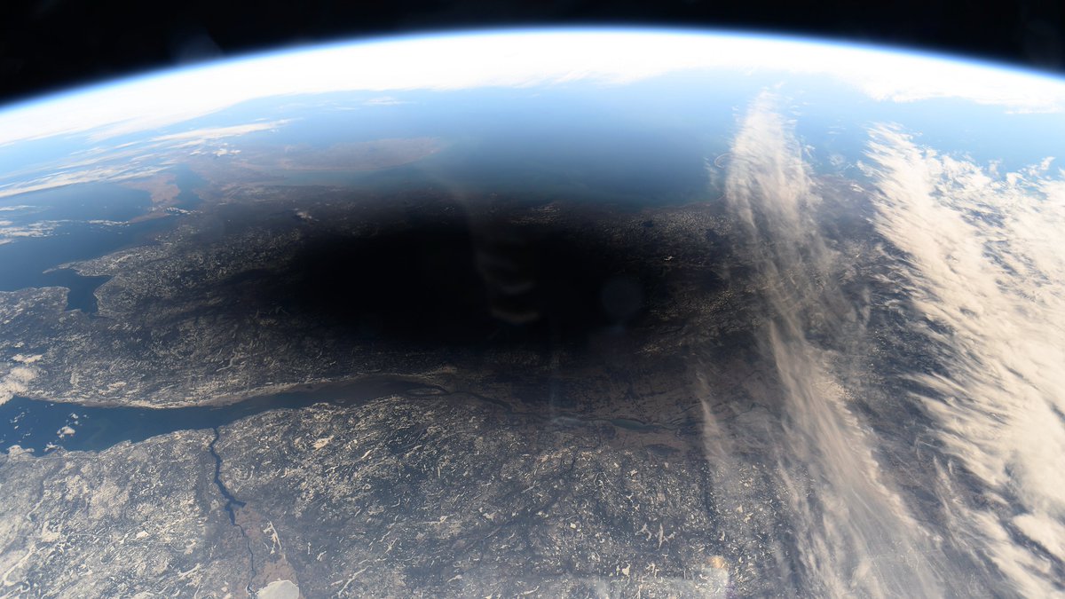 Wow. Yesterday's solar eclipse. From orbit.