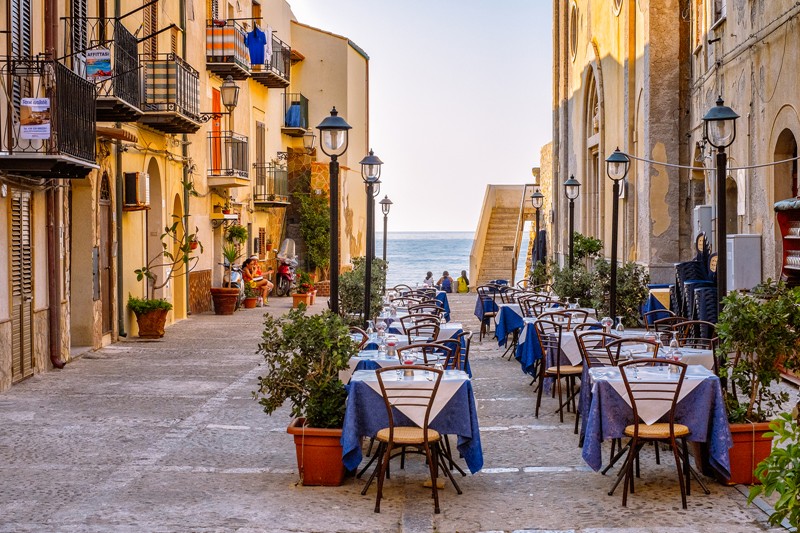 Tables are all set for a starlight dinner in Sicily's Cefalu. Shall we book one for you? #CefaluSicily #RomanticEvening #SicilianNight #DinnerUnderTheStars #sicily #Italy