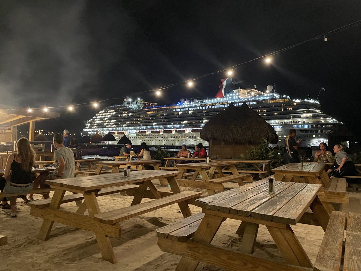 about to have outdoor bbq supper tonight. With the carmival cruise ship as our backdrop. It is HUGE.